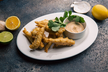 Fish in batter with sauce