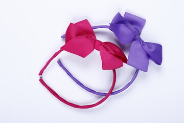 Girl headbands in solid pink and purple colors