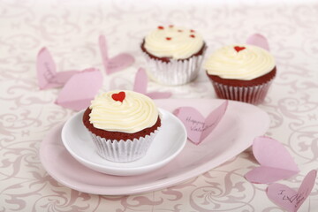 Red velvet cupcakes with hearts for Valentine's Day