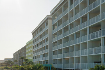 Beachfront hotel buildings with balconies in a row at Destin, Florida