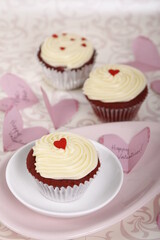 Red velvet cupcakes with hearts for Valentine's Day
