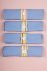 Top shot of table napkins set on pastel colored background