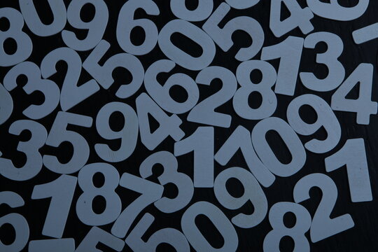 Colorful wooden numbers background. Numbers texture abstraction. Global economy crisis concept. Finance data pattern.
