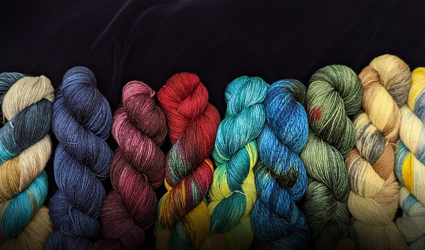 Close up of Colorful Yarn Twists on Velvet, Macro Yarn Photography