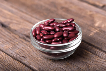 Beans, red beans glass bowl wooden surface