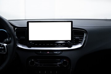 Multimedia screen in the interior of a modern car with space for a message. Copyspace
