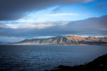 Landscape with Mount Esja and Atlantic ocean coastline in Reykjavik, Iceland. No people, blue...