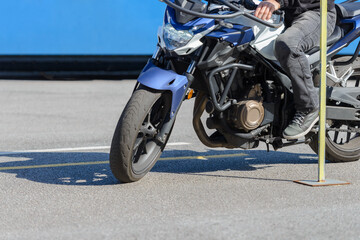 training in a motorcycle school, a detour of a vertical rack, close-up