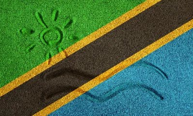 Rolgordijnen Flag of Tanzania on the sand. Sun and sea waves painted on the sand. Vacation concept in the resorts of the Tanzania and Zanzibar. © Nikita