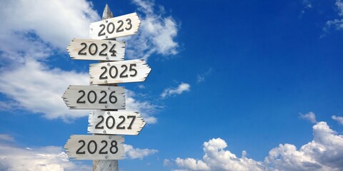 2023, 2024, 2025, 2026, 2027, 2028 - wooden signpost with six arrows © PX Media