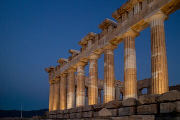 Fototapeta na wymiar View of the Parthenon by night in the Acropolis Hill in Athens, Greece
