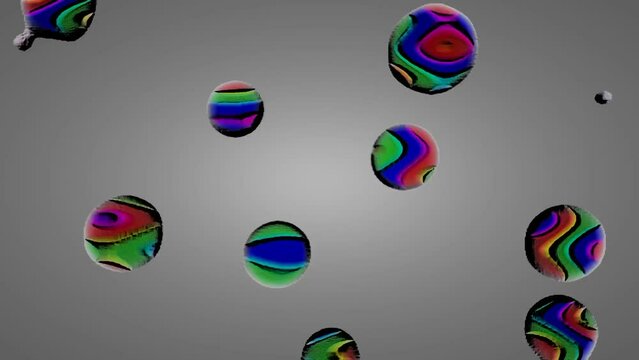 Abstract raindrops falling on colorful balls flying randomly. Close up. Film festival background, celebration, holiday. ball animation