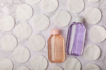 Micellar cleansing water and pads for removing cosmetics and cleansing the skin of sebium. Beauty concept. Skin care. Place for text.MOCAPS. FLETLEY