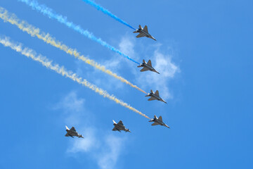 Naklejka na ściany i meble military planes flying over capital of Ukraine Kyiv! Independence Day of Ukraine!
