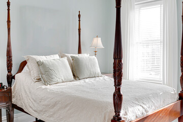 Traditional luxury bedroom wood post