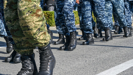 Soldiers in uniform marching on the street. Special armed forces.  