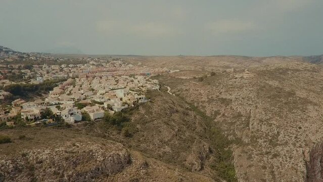 mountain settlement flying over from a drone. High quality FullHD footage