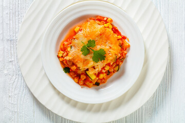enchilada casserole with veggies, corn, pinto bean