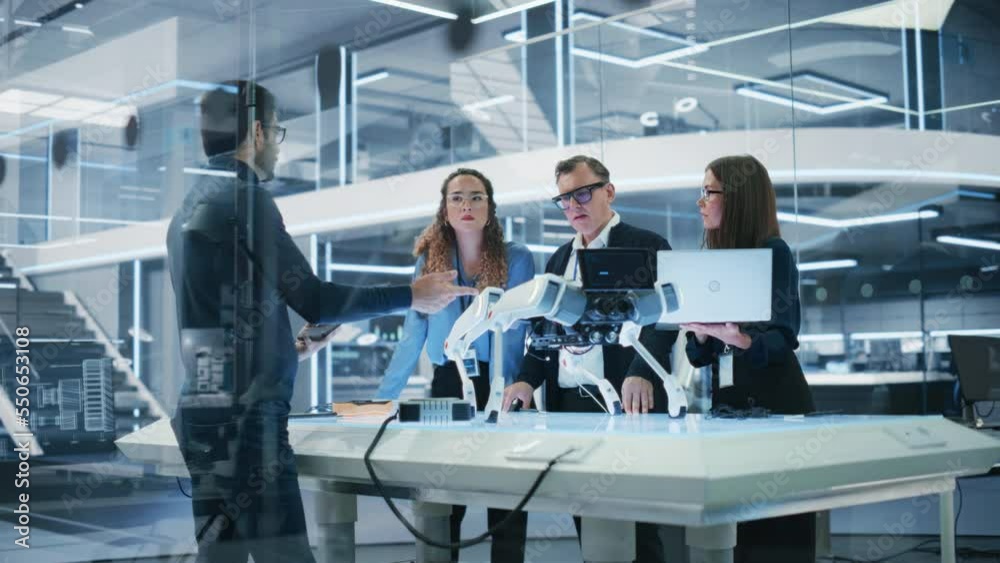 Aufkleber Chief Robotics Engineer Having Meeting with Project Manager and Machinery Operators Next to a Mobile Robot Animal Project. Young Team Using Computers, Discussing the Development of an AI Robotic Dog.