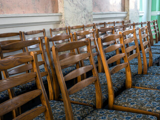 Wooden Chairs Set Up In Rows