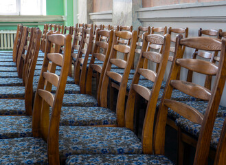 Wooden Chairs Set Up In Rows