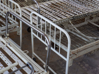 Old rusty hospital bed