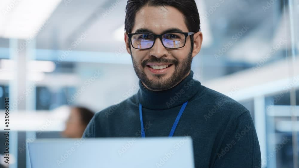 Aufkleber Close Up Portrait of a Talented Latin Man Looking at Camera and Charmingly Smiling. Hispanic Businessman at Work, Information Technology Manager, Software Developer Professional.
