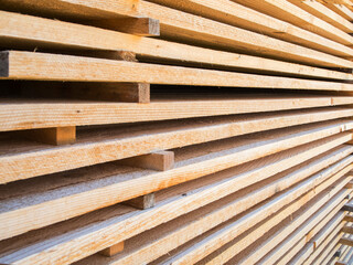 Fresh boards stacked in perspective