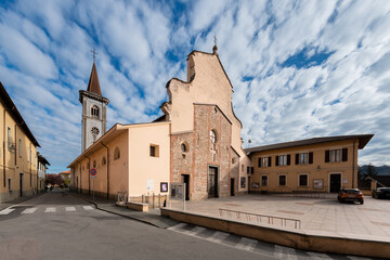 Obraz premium Borgo San Dalamazzo, Cuneo, Italy- December 01, 2022: The parish church of the ancient abbey of San Dalmazzo di Pedona in the town of the cold fair