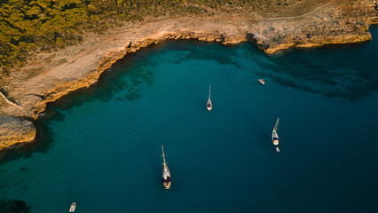 aerial imagery 4k of land and sea with boats