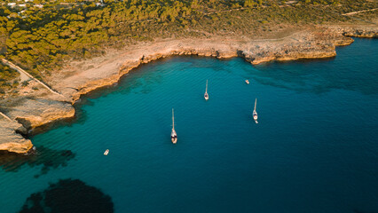 aerial imagery 4k of land and sea with boats