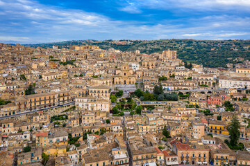 Fototapeta na wymiar Aerial view of Modica, Sicily, Italy. Modica (Ragusa Province), view of the baroque town. Sicily, Italy. Ancient city Modica from above, Sicily, Italy