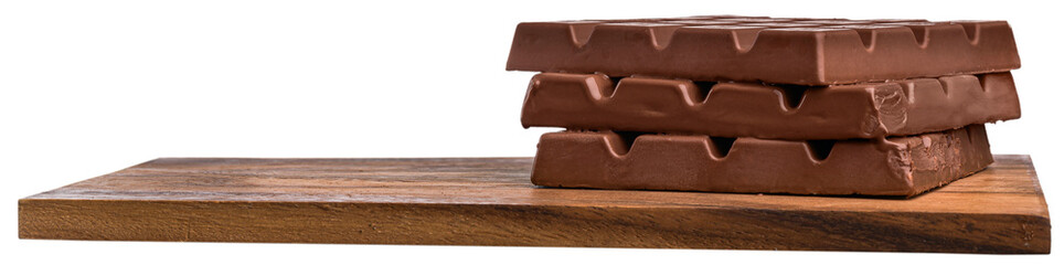 Stack dark chocolate with on desk