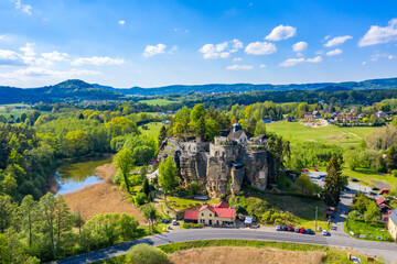 Aerial view of Sloup Castle in Northern Bohemia, Czechia. Sloup rock castle in the small town of Sloup v Cechach, in the Liberec Region, north Bohemia, Czech Republic. - 550659531