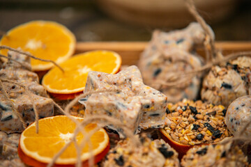 Christmas ornament made of bird seed. Feeding wild birds in winter. Christmas tree decorations.