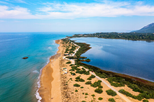 Issos beach on Corfu, near Agios Georgios, Greece. Aerial drone view of Issos beach and Lake Korission, Corfu island, Ionian Sea, Greece. Issos beach, Corfu Island.