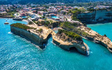 Famous Canal D'amour in Sidari, Corfu island, Greece. Famous Canal d'Amour beach with beautiful rocky coastline in amazing blue Ionian Sea in Sidari holiday village on Corfu island in Greece.