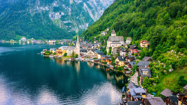 Aerial view of austrian mountain village Hallstatt and Hallstatter lake. Beautiful summer time. Salzkammergut, Austria. Hallstatt village over Hallstatter See, in Salzkammergut, Austria.