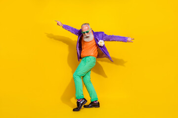 Full length photo of overjoyed retired man meloman wear trendy colorful outfit have fun nightclub...