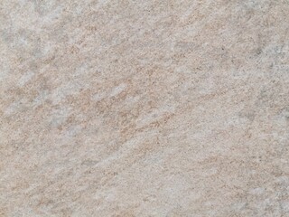 Fondo con detalle y textura de superficie de piedra con degradado de tonos marron suave