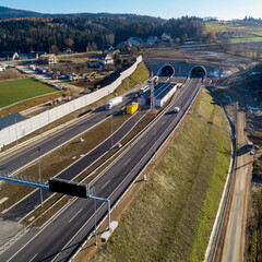 Newly opened tunnel on Zakopianka highway in Poland in November 2022. The tunnel is 2 over km long and makes travel from Krakow to Zakopane, Podhale region and Slovakia much faster. Old road above - 550661583
