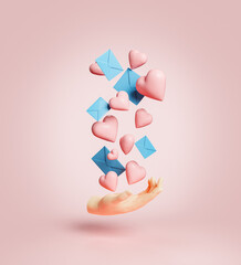 hand with hearts and letters falling