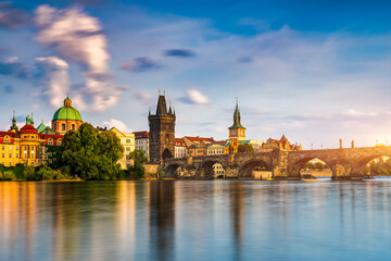 Charles Bridge sunset view of the Old Town pier architecture, Charles Bridge over Vltava river in...
