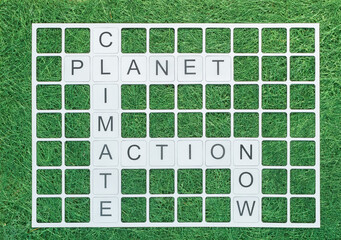 Mots croisés avec les mots Planète, Climat, Action, Maintenant. Concept d'écologie sur une...