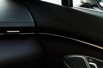 Obraz na płótnie Canvas Modern car interior close up view with metallic and plastic details. Interior detail.