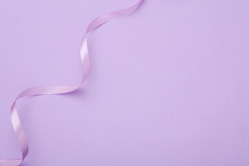 Blank holiday background with satin lavender ribbon