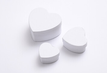 White heart shaped gift boxes mockup isolated on white background