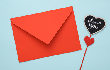 Valentine's Day. Red love envelope on blue background