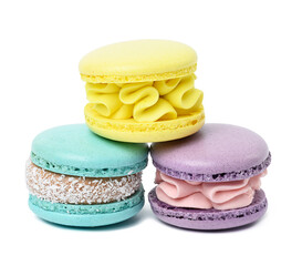 Baked almond macaron with cream on a white isolated background