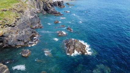 Beautiful rocky shore. Turquoise sea water. Seaside landscape. Nature of Ireland. Landscapes of West Cork. Aerial photo.
